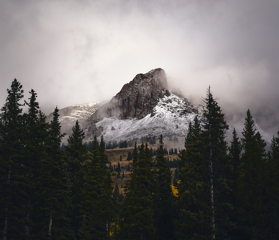A rocky outcropping of Grand Turk emerges from low clouds near Molas Lake.